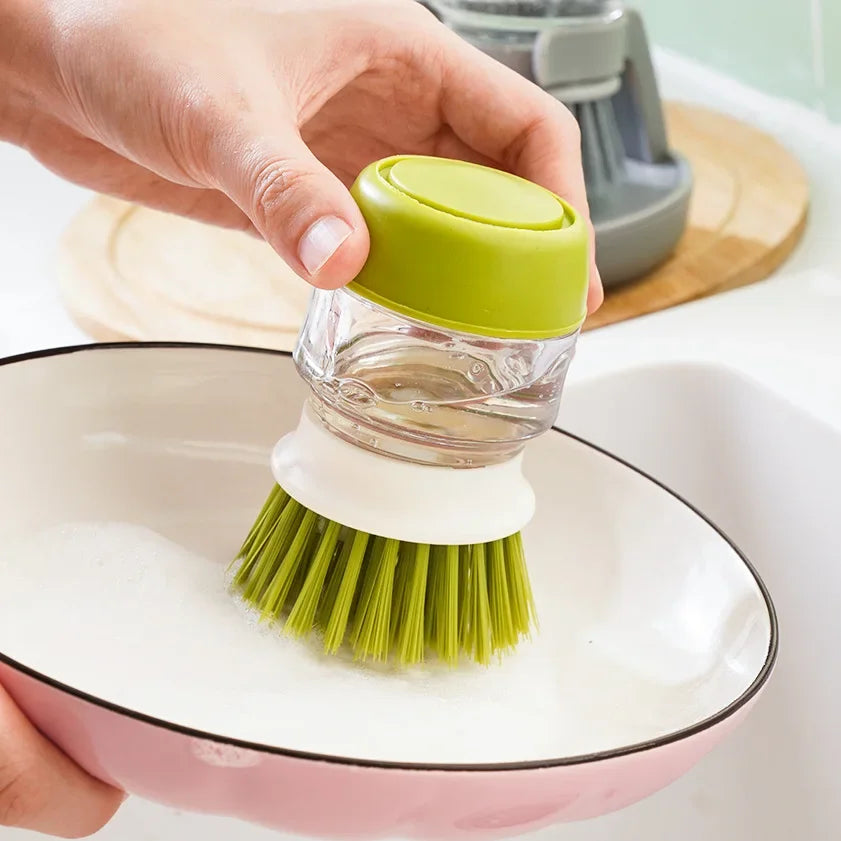 Brosse vaisselle avec réservoir